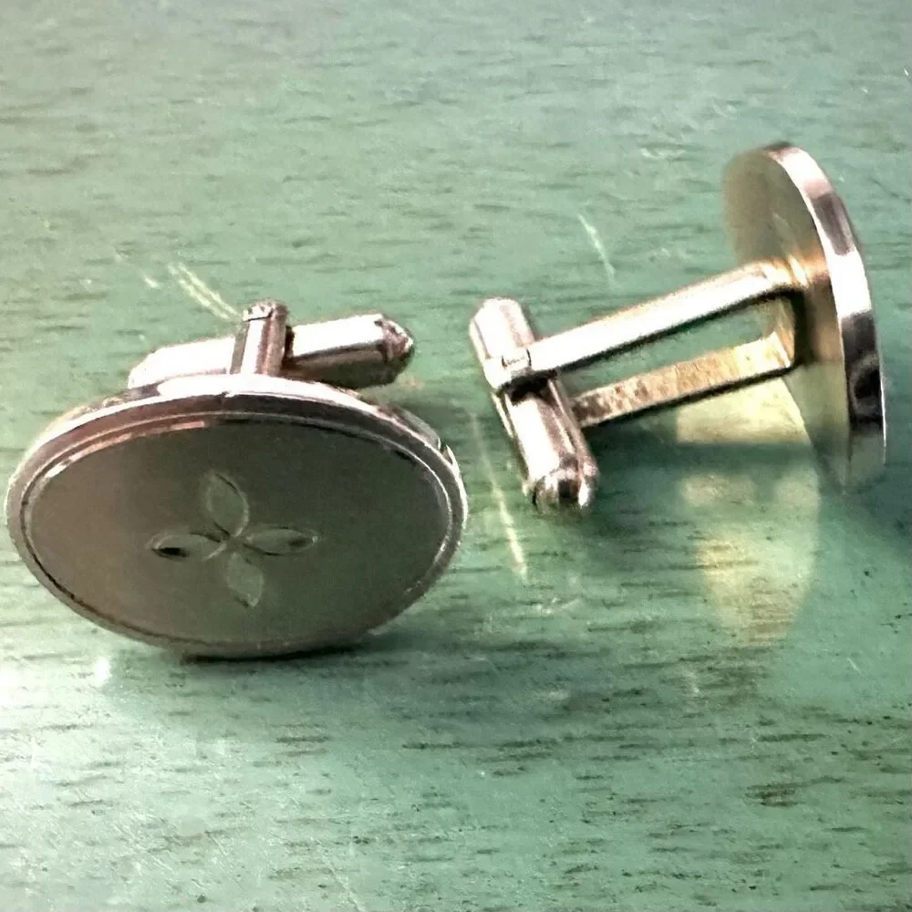 Silver tone oval vintage cuff links